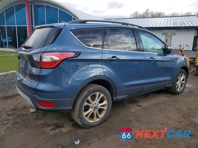 Trzecie zdjęcie samochodu z tyłu: 2018 FORD ESCAPE SE VIN:1FMCU9GD3JUB75203 - miniatura