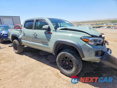 Czwarte zdjęcie samochodu z boku: 2022 TOYOTA TACOMA TRD OFF-ROAD VIN:3TYCZ5AN6NT055474 - miniatura