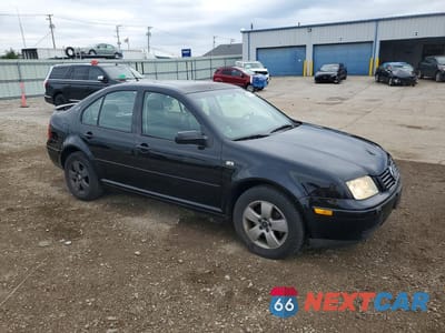 Czwarte zdjęcie samochodu z boku: 2003 VOLKSWAGEN JETTA GLS TDI VIN:3VWSP69M63M180547 - miniatura