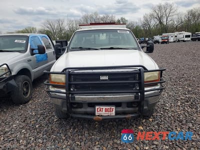 Piąte zdjęcie samochodu w środku: 1999 FORD F350 SUPER DUTY FLATBED TRUCK VIN:1FTSW31F1XEE65931 - miniatura
