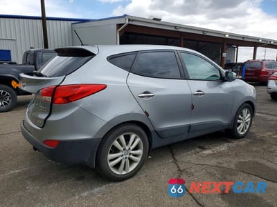 Trzecie zdjęcie samochodu z tyłu: 2013 HYUNDAI TUCSON LIMITED VIN:KM8JUCAC6DU690592 - miniatura