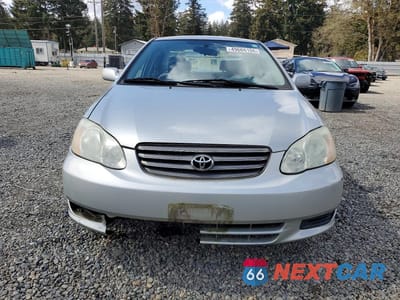 Piąte zdjęcie samochodu w środku: 2003 TOYOTA COROLLA LE VIN:1NXBR32E13Z033879 - miniatura