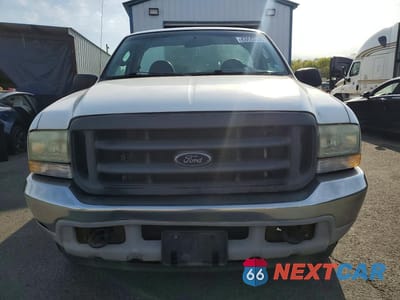 Piąte zdjęcie samochodu w środku: 2003 FORD F250 SUPER DUTY VIN:1FTNF20L33ED41989 - miniatura