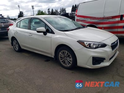Czwarte zdjęcie samochodu z boku: 2017 SUBARU IMPREZA PREMIUM VIN:4S3GKAB60H3601581 - miniatura
