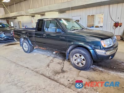 Czwarte zdjęcie samochodu z boku: 1999 NISSAN FRONTIER XE-V6 VIN:1N6ED26Y6XC335448 - miniatura