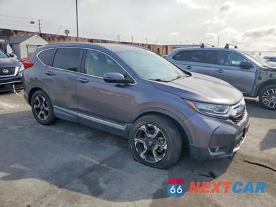 Czwarte zdjęcie samochodu z boku: 2017 HONDA CR-V TOURING VIN:7FARW1H96HE022018 - miniatura