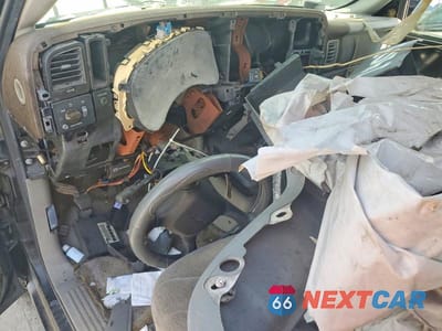 Zdjęcie 8 z 11 samochodu: 1999 GMC NEW SIERRA K1500 VIN:1GTEK19T2XE550686 - miniatura