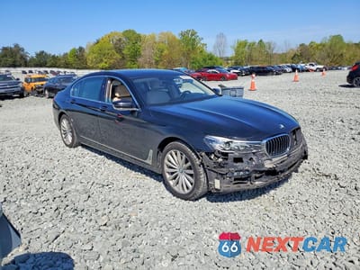 Czwarte zdjęcie samochodu z boku: 2016 BMW 740 I VIN:WBA7E2C54GG503919 - miniatura