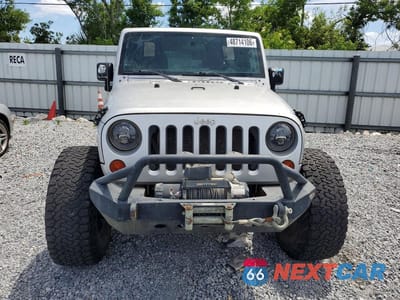 Piąte zdjęcie samochodu w środku: 2011 JEEP WRANGLER UNLIMITED SPORT VIN:1J4BA3H14BL568476 - miniatura