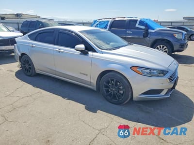 Czwarte zdjęcie samochodu z boku: 2017 FORD FUSION SE HYBRID VIN:3FA6P0LU5HR314149 - miniatura