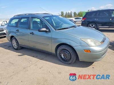 Czwarte zdjęcie samochodu z boku: 2003 FORD FOCUS SE VIN:1FAFP36373W115453 - miniatura