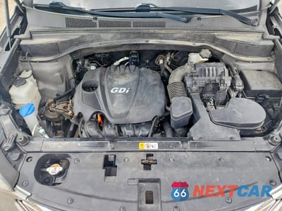 Zdjęcie 12 z 13 samochodu: 2014 HYUNDAI SANTA FE SPORT 2.4L VIN:5XYZUDLB7EG176349 - miniatura