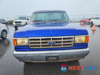 Piąte zdjęcie samochodu w środku: 1987 FORD F150 FLATBED TRUCK VIN:1FTEF14H4HKA46876 - miniatura