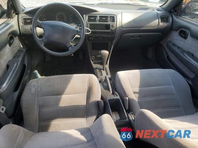 Zdjęcie 8 z 12 samochodu: 1994 TOYOTA COROLLA DX VIN:1NXAE09B1RZ183033 - miniatura