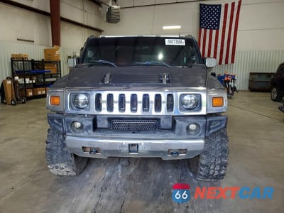 Piąte zdjęcie samochodu w środku: 2004 HUMMER H2 VIN:5GRGN23U54H121073 - miniatura