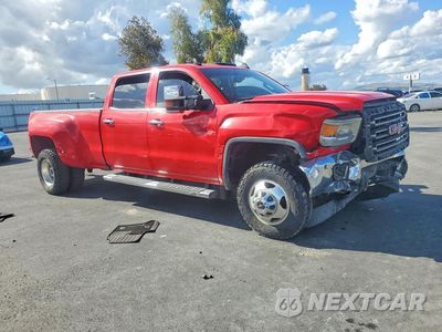 Czwarte zdjęcie samochodu z boku: 2016 GMC SIERRA K3500 SLT VIN:1GT42XE82GF226308 - miniatura