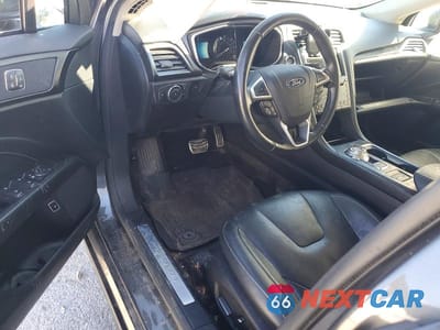 Zdjęcie 8 z 14 samochodu: 2017 FORD FUSION TITANIUM PHEV VIN:3FA6P0SU1HR272239 - miniatura