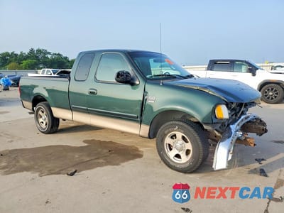 Czwarte zdjęcie samochodu z boku: 2001 FORD F150 VIN:1FTRX17L61NA33260 - miniatura