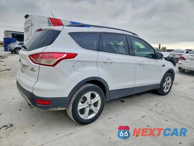 Trzecie zdjęcie samochodu z tyłu: 2016 FORD ESCAPE SE VIN:1FMCU0GX5GUB07029 - miniatura