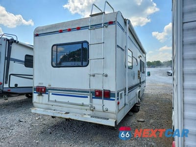 Czwarte zdjęcie samochodu z boku: 1997 FORD ECONOLINE E450 SUPER DUTY CUTAWAY VAN RV VIN:1FDLE40S2VHB27859 - miniatura