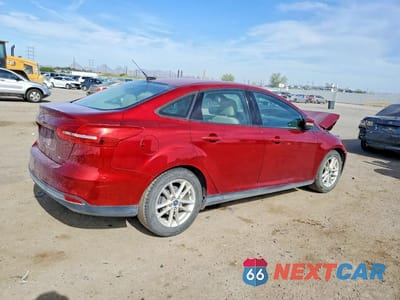 Trzecie zdjęcie samochodu z tyłu: 2017 FORD FOCUS SE VIN:1FADP3F22HL214611 - miniatura