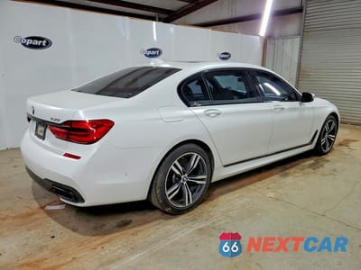 Trzecie zdjęcie samochodu z tyłu: 2018 BMW 750 I VIN:WBA7F0C58JGM24004 - miniatura
