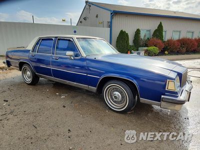 Czwarte zdjęcie samochodu z boku: 1984 BUICK LESABRE CUSTOM VIN:1G4AN69Y5EH927632 - miniatura