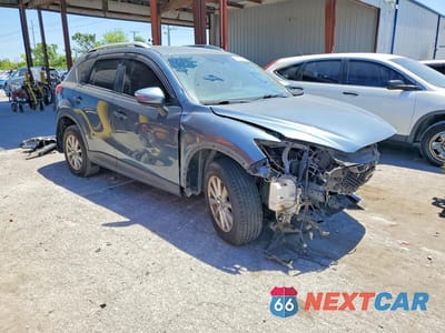 Czwarte zdjęcie samochodu z boku: 2015 MAZDA CX-5 SPORT VIN:JM3KE2BE9F0516436 - miniatura