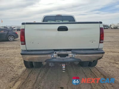 Zdjęcie 6 z 12 samochodu: 1999 FORD F350 SUPER DUTY VIN:1FTWX33F9XEA62386 - miniatura