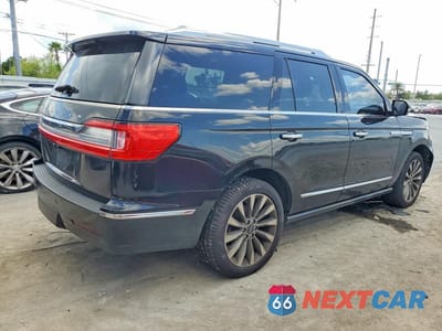 Trzecie zdjęcie samochodu z tyłu: 2018 LINCOLN NAVIGATOR SELECT VIN:5LMJJ2HT5JEL11237 - miniatura