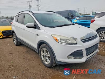 Czwarte zdjęcie samochodu z boku: 2016 FORD ESCAPE SE VIN:1FMCU9GX6GUC32576 - miniatura