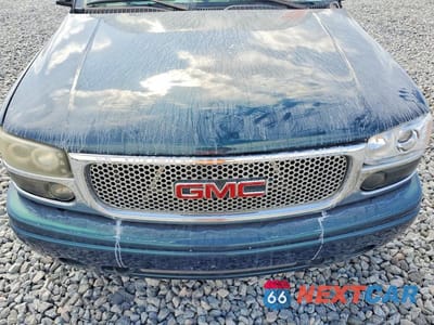Zdjęcie 12 z 13 samochodu: 2005 GMC YUKON DENALI VIN:1GKEK63U05J243234 - miniatura