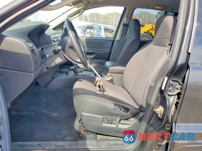 Zdjęcie 7 z 13 samochodu: 2004 JEEP GRAND CHEROKEE LAREDO VIN:1J4GW48N74C332617 - miniatura