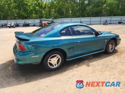 Trzecie zdjęcie samochodu z tyłu: 1998 FORD MUSTANG VIN:1FAFP4042WF242221 - miniatura