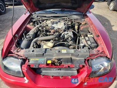 Zdjęcie 11 z 11 samochodu: 2004 FORD MUSTANG VIN:1FAFP40684F240598 - miniatura