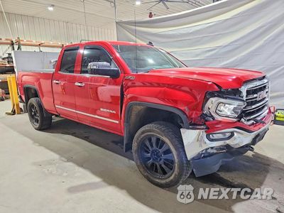 Czwarte zdjęcie samochodu z boku: 2018 GMC SIERRA K1500 SLT VIN:1GTV2NEC4JZ124916 - miniatura