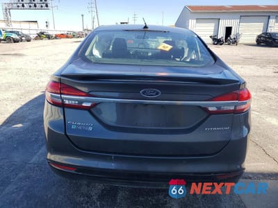 Zdjęcie 6 z 14 samochodu: 2017 FORD FUSION TITANIUM PHEV VIN:3FA6P0SU1HR272239 - miniatura