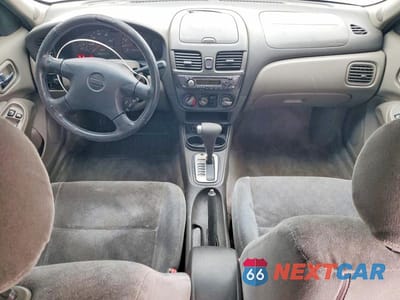 Zdjęcie 8 z 12 samochodu: 2002 NISSAN SENTRA GXE VIN:3N1CB51A82L556285 - miniatura