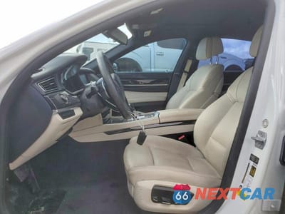 Zdjęcie 7 z 13 samochodu: 2014 BMW 740 I VIN:WBAYA6C50ED144154 - miniatura