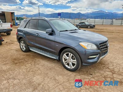 Czwarte zdjęcie samochodu z boku: 2012 MERCEDES-BENZ ML 350 BLUETEC VIN:4JGDA2EB8CA017322 - miniatura