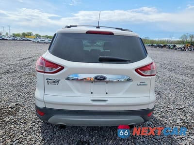 Zdjęcie 6 z 12 samochodu: 2013 FORD ESCAPE SEL VIN:1FMCU0HX5DUD77016 - miniatura