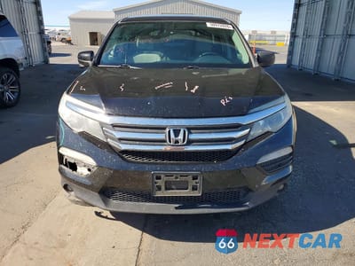 Piąte zdjęcie samochodu w środku: 2016 HONDA PILOT EX VIN:5FNYF5H3XGB023164 - miniatura