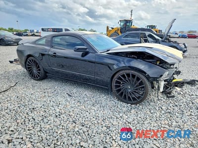 Czwarte zdjęcie samochodu z boku: 2014 FORD MUSTANG GT VIN:1ZVBP8CF7E5206992 - miniatura