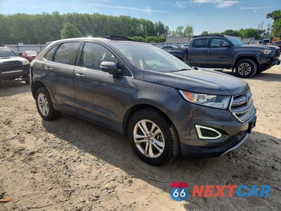 Czwarte zdjęcie samochodu z boku: 2015 FORD EDGE SEL VIN:2FMTK4J81FBC27722 - miniatura