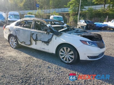Czwarte zdjęcie samochodu z boku: 2013 LINCOLN MKS VIN:1LNHL9FT8DG612097 - miniatura