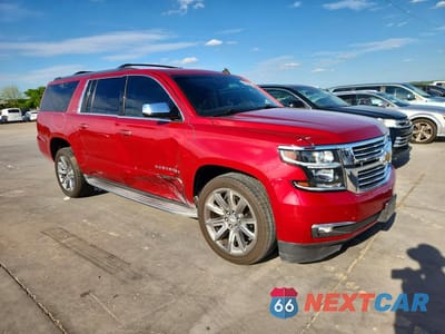 Czwarte zdjęcie samochodu z boku: 2015 CHEVROLET SUBURBAN C1500 LTZ VIN:1GNSCKKC4FR162177 - miniatura