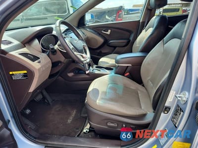 Zdjęcie 7 z 12 samochodu: 2013 HYUNDAI TUCSON LIMITED VIN:KM8JU3AC2DU616831 - miniatura