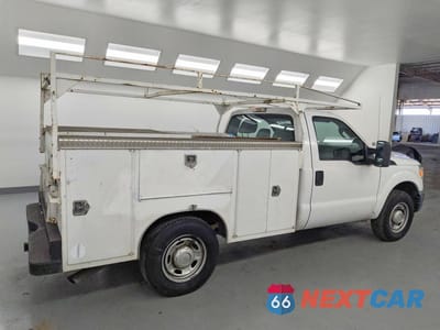 Trzecie zdjęcie samochodu z tyłu: 2015 FORD F350 SUPER DUTY VIN:1FTBF3A6XFEA66062 - miniatura