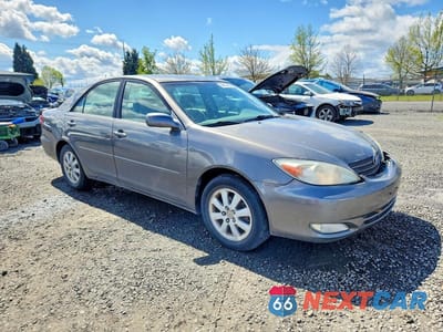 Czwarte zdjęcie samochodu z boku: 2003 TOYOTA CAMRY XLE VIN:4T1BE30K93U708625 - miniatura