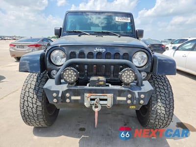 Piąte zdjęcie samochodu w środku: 2014 JEEP WRANGLER UNLIMITED SAHARA VIN:1C4BJWEG9EL100473 - miniatura